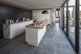 Kitchen and Ceramic Tile Floor  Photo 18 of 19 in Patio House by Marc Melissen