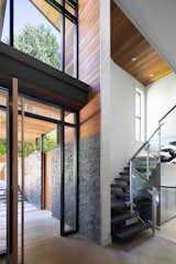 Doors, Wood, Interior, and Swing Door Type Geometric House - ONE SEED Architecture + Interiors: Entry Atrium  Photo 5 of 17 in Geometric House - ONE SEED Architecture + Interiors by ONE SEED Architecture + Interiors