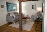 The guesthouse living and kitchen are a 70's addition to the original meat house, constructed from pine trees on the property, and left with bark intact.