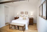 The bedroom occupies the part of the guesthouse that was the original meat house, constructed at the same time as the 1827 main house.