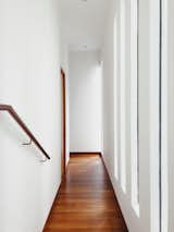 Light filled corridor towards back of house. 