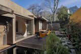 Outdoor, Small, Shrubs, Back Yard, Trees, and Shower  Outdoor Trees Shower Shrubs Photos from A Cork-Covered Retreat in South Africa Is Built Using Mass Timber