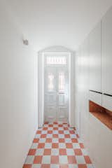  Photo 1 of 13 in A Lisbon Apartment Building Is Brought Back to Life With Tidy, Light-Filled Interiors