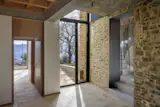 The glass and steel entrance that connects the 17th-century tower to the rest of the house.
