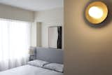 Bedroom, Wall Lighting, Porcelain Tile Floor, Ceiling Lighting, Bed, and Wardrobe  Photo 10 of 18 in 42 Broadway by Human w/ Design
