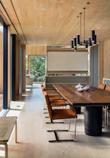 The woodwork in the Chilmark House dining room is especially stunning; Schiller Projects designed, built, and collaborated on many of the freestanding furniture pieces in the house.