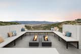 Fireplace on the outdoor deck. 