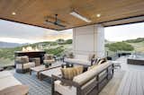 Outdoor covered deck off of basement.