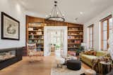 Designed to spark joy and conversation, we didn't hold back on colors and textures. in this space. From the custom Kermit sofa, pink leopard print ottoman to the wild Tiger-grain Maple Maloof Rocker. Extra fun fact: the Kermit sofa is a re-upholstered inherited piece from the owners grandmother who lived in the original farmhouse in the 1940's. 