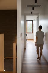 Hallway and Medium Hardwood Floor  Photo 17 of 19 in LAMA House by Billy Lam Architect