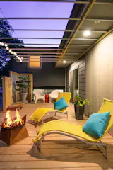An outdoor living room gives this 1800 sq ft home additional living space in the warmer months.