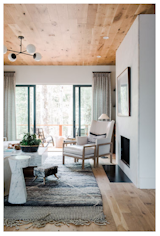 White walls allow for the natural light to really illuminate the space, while the white materials combine with other soft colors to prevent the space from looking monotone.