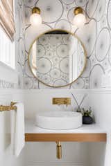 Jewel box Powder Room with bicycle wheel wallpaper from Fliepaper.