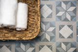 Chic and practical porcelain deco Floor tile by Country Floors.
