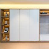 Living Room, Shelves, Storage, Ceiling Lighting, Recessed Lighting, and Vinyl Floor Veneer Shelvings - Sensuous and clean.  Photo 3 of 17 in Posh & Polished : State-Of-The-Art Residence by SQR Architecture + Interior Design