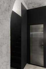 Hallway and Concrete Floor  Photo 14 of 18 in THE KULT STUDIO | TATTOO & BARBER by Sivak+Partners studio