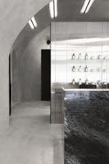 Hallway and Concrete Floor  Photo 15 of 18 in THE KULT STUDIO | TATTOO & BARBER by Sivak+Partners studio