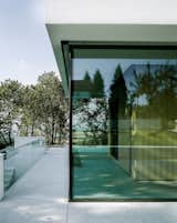 Outdoor, Large Patio, Porch, Deck, Landscape Lighting, Trees, Gardens, Grass, Small Pools, Tubs, Shower, Stone Fences, Wall, Walkways, and Side Yard back site  Photo 13 of 13 in Villa Philipp by PHILIPPARCHITEKTEN // anna philipp