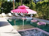 Relax in a pink tiled saltwater pool.