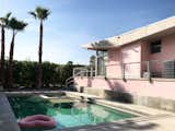 The house boasts a pink exterior.