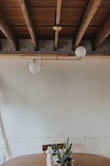 Handmade light fixture, exposed ceilings & walls exactly like we found them, with the exception of a fresh coat of paint. 