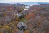Backing the Sluice of Northport Bay on 2.58 acres