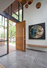 Hallway and Ceramic Tile Floor  Photo 8 of 14 in Erie Avenue Residence by Robert Hintz