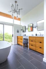 Bath Room, Pendant Lighting, Freestanding Tub, Accent Lighting, and Ceramic Tile Floor  Photo 7 of 27 in Lookout House by Robert Hintz