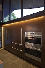 Kitchen, Recessed Lighting, Refrigerator, Wall Oven, Ceramic Tile Floor, Microwave, Track Lighting, and Wood Cabinet  Photo 7 of 13 in Savage Kitchen by Robert Hintz