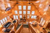 Log Home in Michigan's Lake Superior Highlands, luxurious surroundings and warm winter comfort with five fireplaces and year-round beauty.