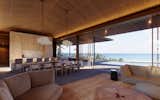 Living Room, Ceiling Lighting, Limestone Floor, Sofa, Coffee Tables, Chair, and Pendant Lighting  Photo 6 of 11 in Hale Hapuna by Eerkes Architects