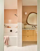 The fun colored tile, in incremental sizes and different textures, both matte and glossy, is used throughout the home. It provided an opportunity to play with scale, texture and format. Each bathroom and both kitchens, in the main home and the guest house (ADU) have their own unique color and personality.