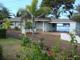 Front of the house with ocean view carport