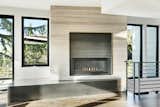 Custom steel fireplace with cedar facade