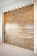 Bedroom with large sliding door  Photo 16 of 27 in Renton Hill House by Collaborative Companies