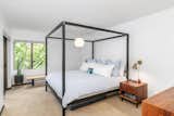 Master bedroom with Room & Board architecture bed and George Nelson criss-cross ball pendant