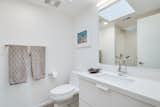 A skylight illuminates one of the two renovated bathrooms.