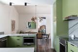 Kitchen w/ quartzite counters, Dunn Edwards "Frond" green custom cabinets