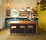 The Smith family desired an open kitchen, reinforced by shelving and minimal amounts of locally made cabinetry.