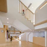 The staircase is a defining feature at the school, connecting the flexible play area with the science and art classrooms.