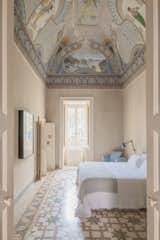 A ceiling fresco and mosaic floor steal the limelight in the Royal Junior suite.