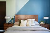 Echoing the living room's color palette, the guest bedroom features a mix of Benjamin Moore "Mozart Blue" and "Heavenly Blue."