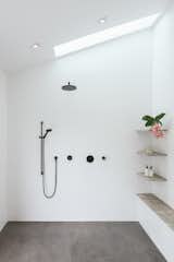 Vista Residence by ANACAPA minimalist shower with skylight