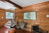 Minutes from the Windham Mountain resort (currently closed due to the COVID-19 pandemic), this wood-shrouded Maplecrest cabin has all the welcome trappings of a relaxing, rural weekend sanctuary: a grill for carefree barbecues, a front-porch swing, a quartet of Adirondack chairs gathered around a barrel table, and bunk beds that conjure childhood campgrounds. There’s also a brand-new kitchen with gleaming tiles to whip up meals that can be served in the dining room, accentuated by a pouf and black-and-white patterned seating.&nbsp;