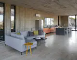 The living room, flowing off the kitchen, was an exercise in simplicity. During the winter, when the terrace is not being utilized, it becomes another area for friends and family to gather.