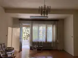 Before: Rather than relegate the living area to one room, like its previous incarnation, Sarolta envisioned a flowing, open space in her renovation.