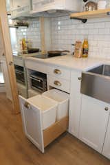 Every inch was planned for in this tiny home including where to put a garbage and recycling.  