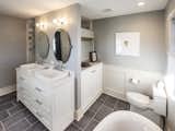 Bath Room, Open Shower, Drop In Sink, Ceiling Lighting, Freestanding Tub, and Wall Lighting  Photo 1 of 29 in Glen Ellyn Transformation by Liv Companies