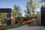 Exterior, Wood Siding Material, Flat RoofLine, Metal Siding Material, and House Building Type Entry Courtyard  Photo 3 of 20 in Ravine House by Wheeler Kearns Architects