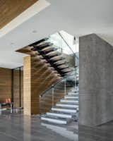 Staircase, Metal Tread, Wood Tread, and Glass Railing  Photo 10 of 14 in Cayambe by Punch Architecture
